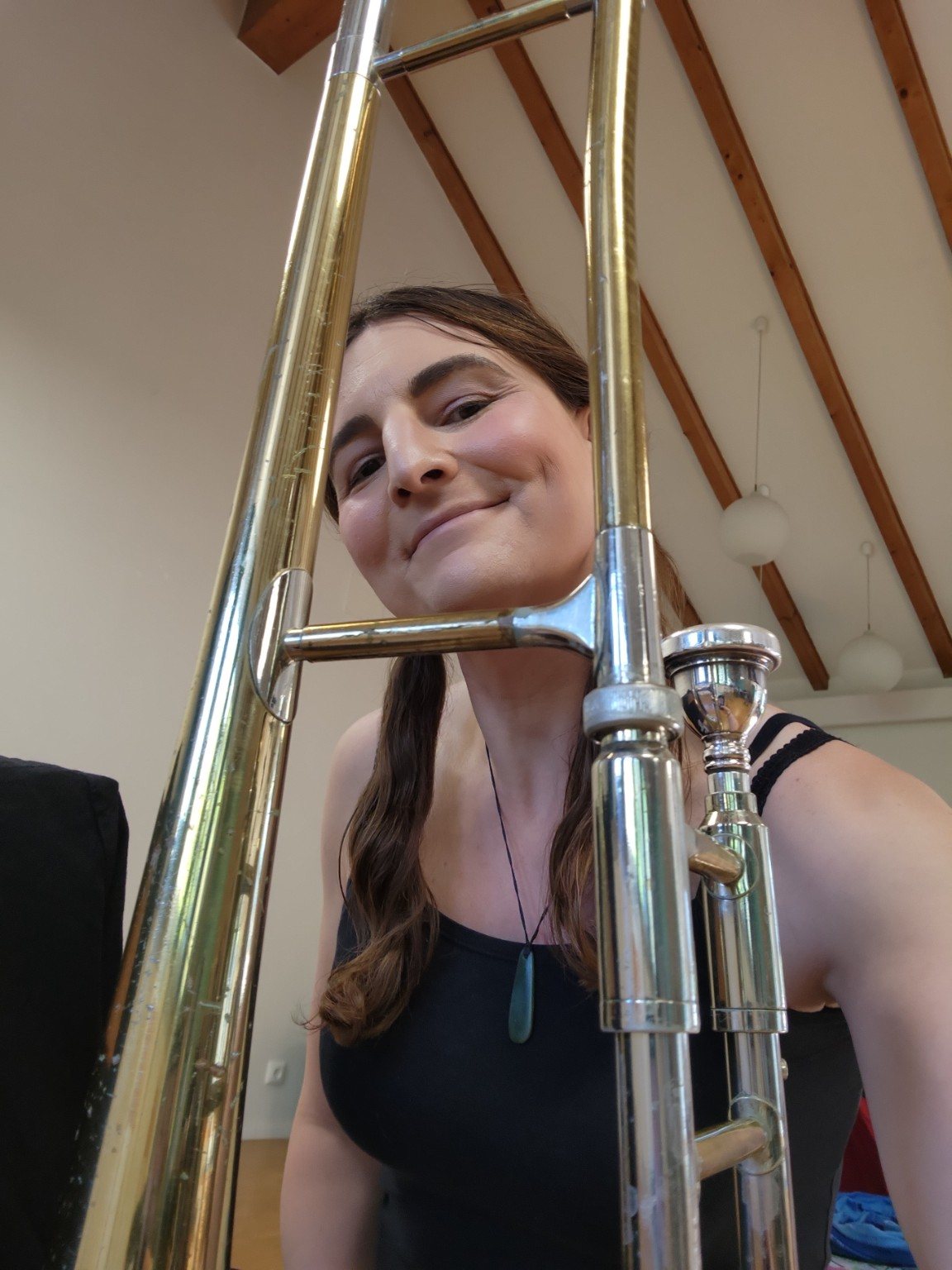 Diana S. Engelhard with a trombone.